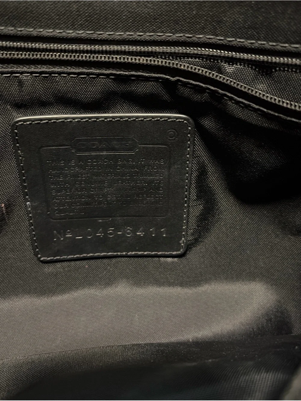Coach sleek black